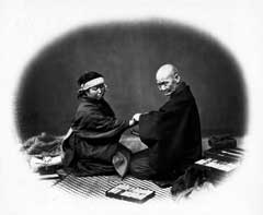 患者の脈をとる医者